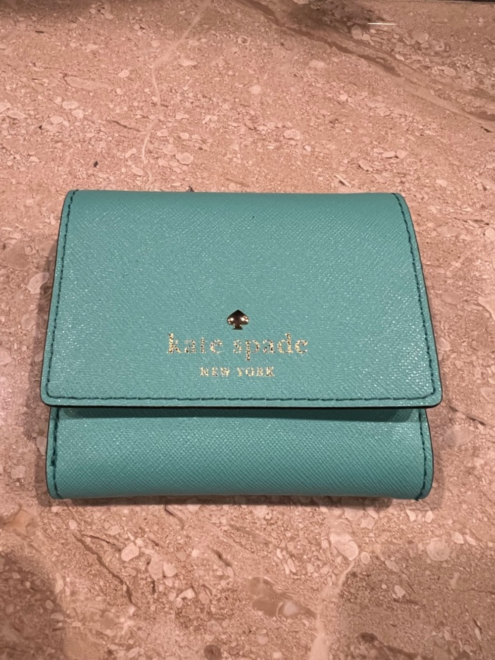 kate spade teal/turquoise leather compact wallet with gold logo